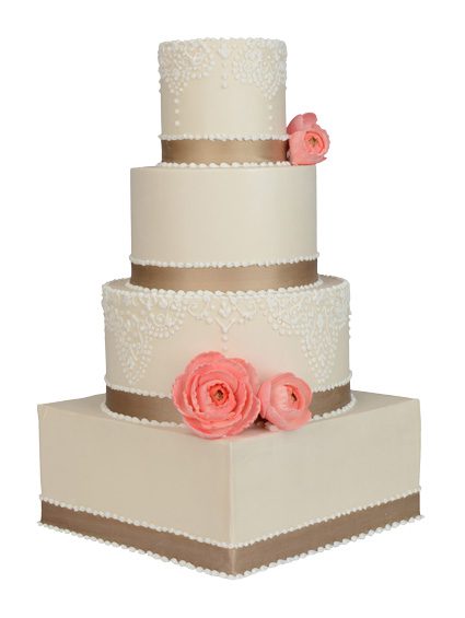 Traditional tiered wedding cake with icing detail and sugar flowers.  All Things Cake, Tulsa.  Photo by Natalie Green. 