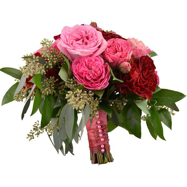 Pink and red garden roses, seeded eucalyptus and wild smilax. Toni’s Flowers and Gifts, Tulsa.
