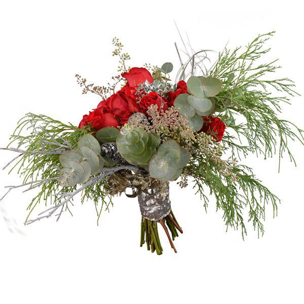 Christmas bride bouquet with freedom roses, succulents, air plants, pine cones, Christmas greens and succulents; Ted and Debbie’s Flower and Garden. Tulsa.