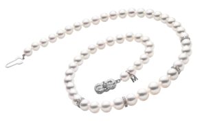 Mikimoto pearl and diamond necklace, $7,320, Bruce G. Weber Precious Jewels