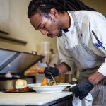 Bennett cooks up the filet mignon in the Bin 35 Bistro kitchen.